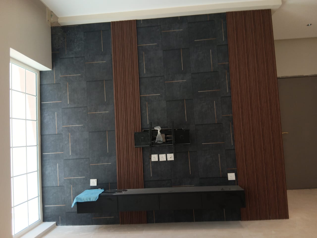 جدار تلفزيون بتصميم ثلاثي الأبعاد